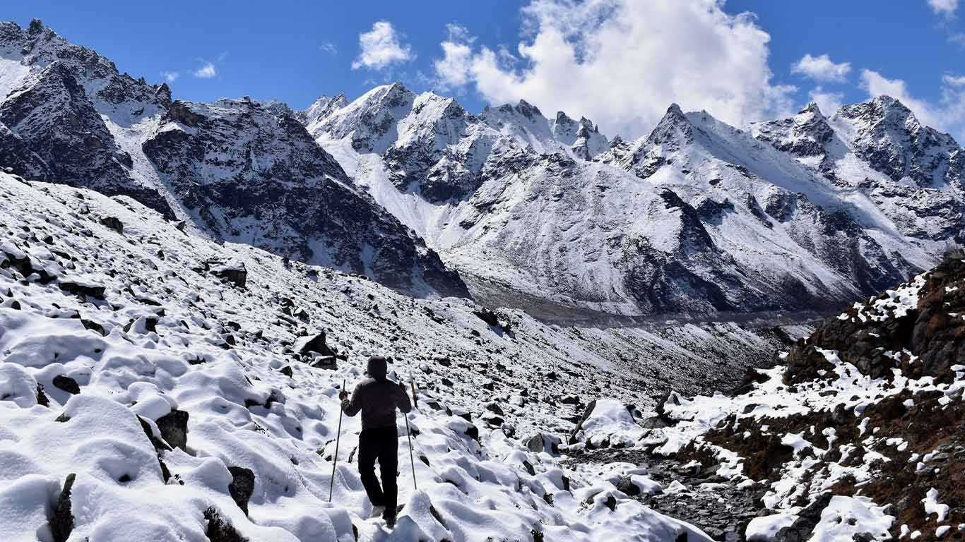 A trekker hiking on snow kanchenjunga base camp