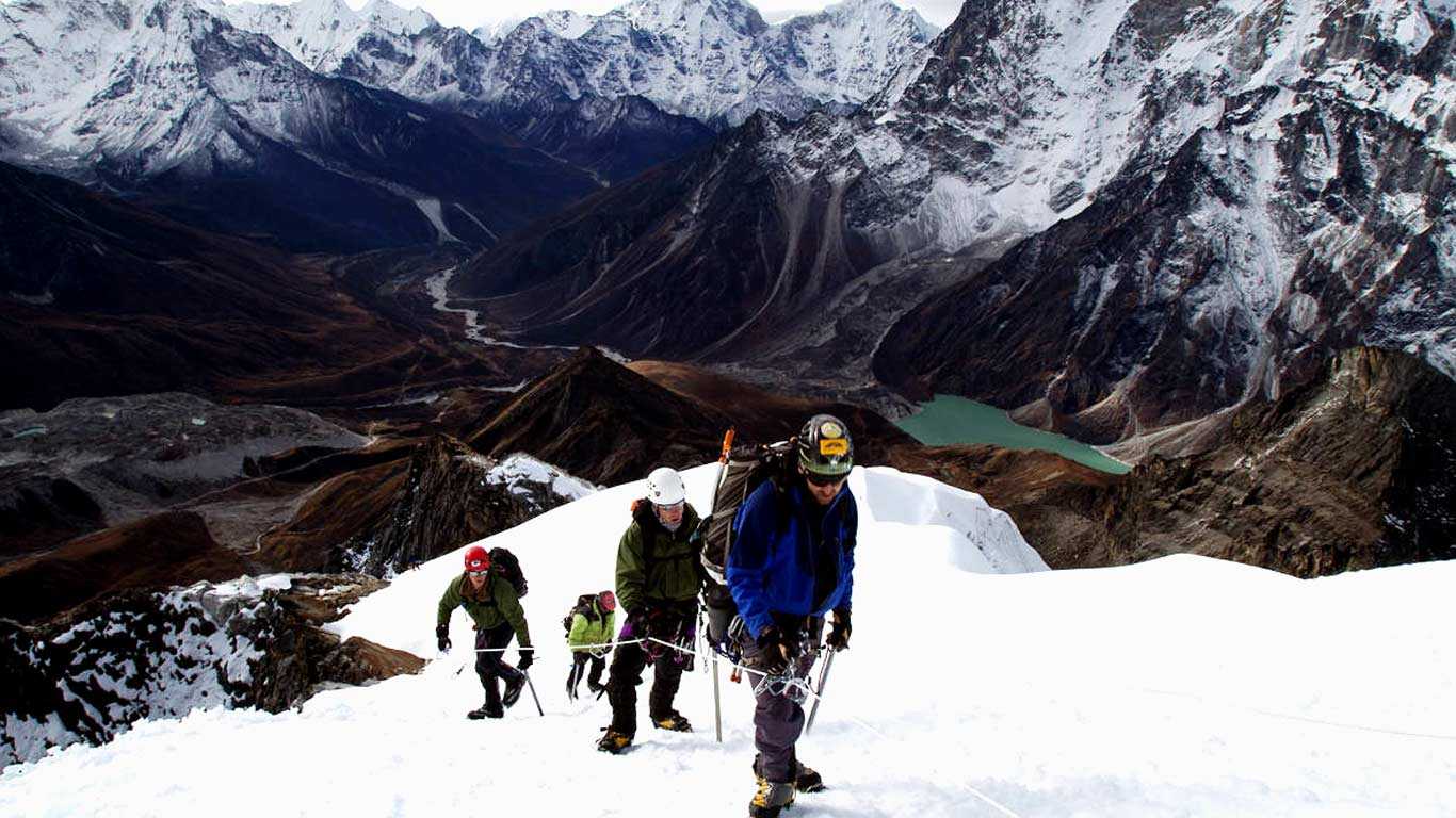 Climbers are at the top of Lobuche Peak