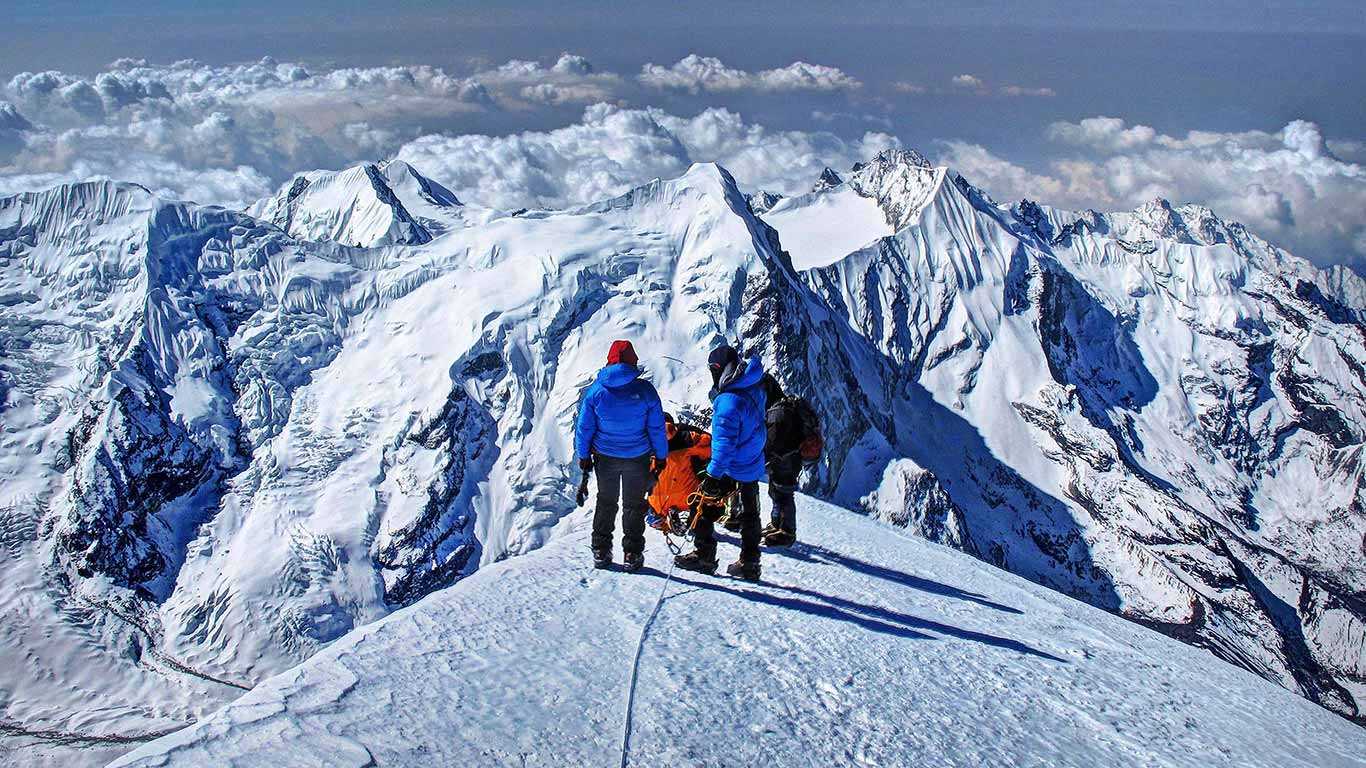 A Group of Climbers are on top of Mera Peak